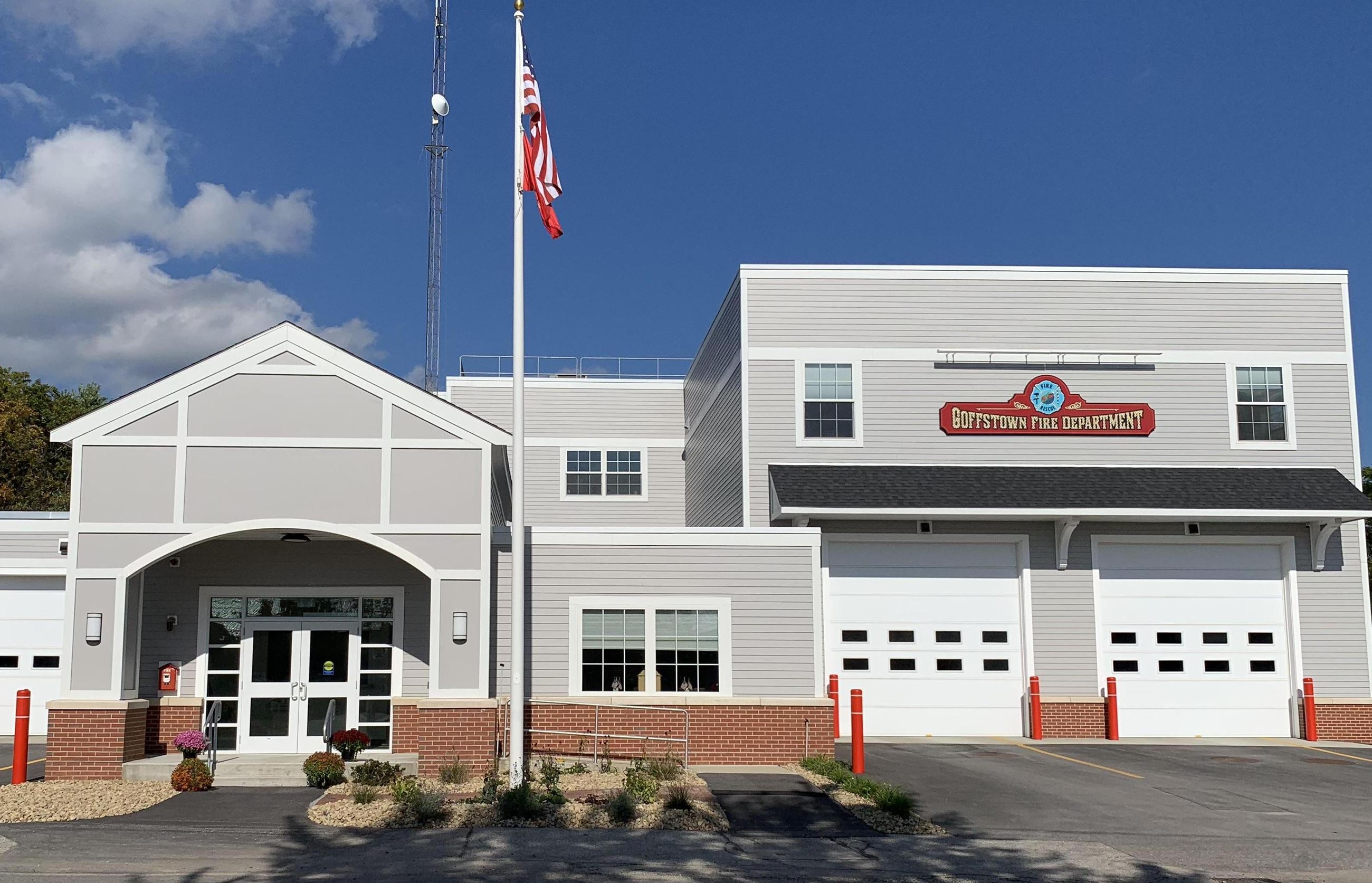 Firehouse with gray siding and white trim
