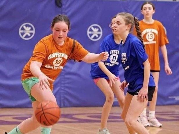 ball handler wards off defender